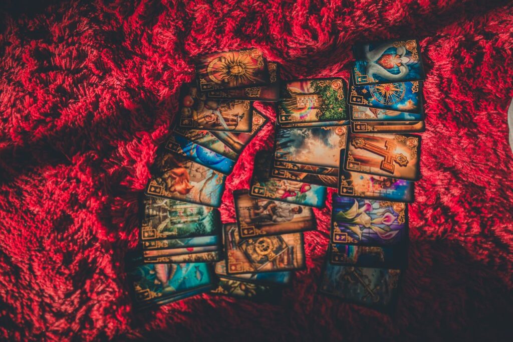 Tarot Cards Laid out on Red Fabric