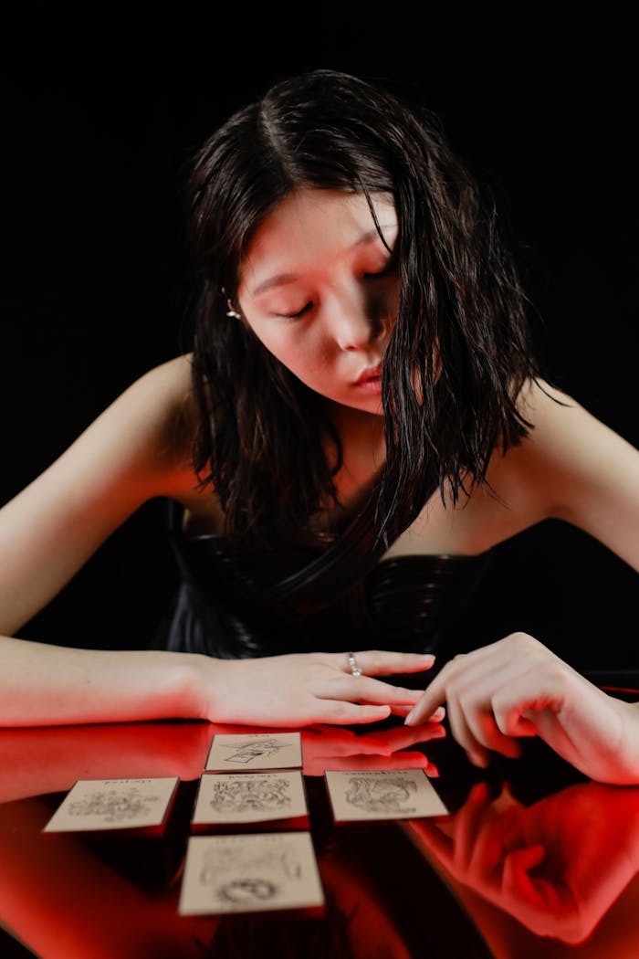 Photo of a Woman with Tarot Cards